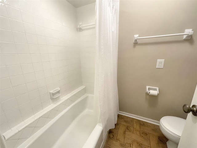 bathroom with parquet floors, toilet, and shower / bathtub combination with curtain