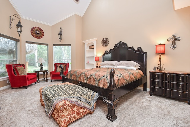 bedroom featuring ornamental molding, carpet floors, and high vaulted ceiling