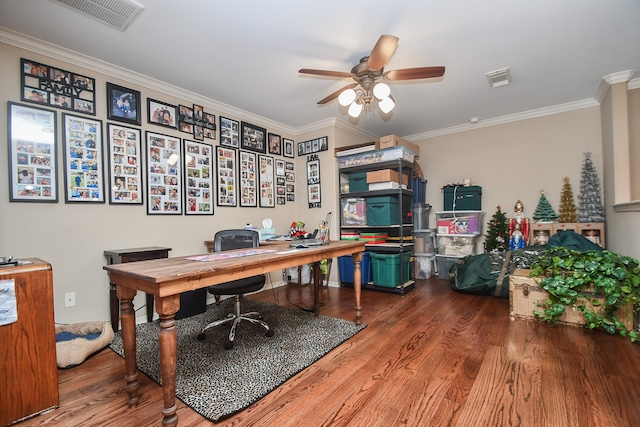 office space with crown molding, wood-type flooring, and ceiling fan