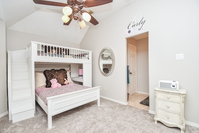 bedroom featuring lofted ceiling, light colored carpet, and ceiling fan