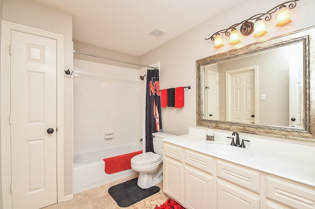 full bathroom featuring vanity, toilet, shower / bath combo with shower curtain, and tile patterned flooring