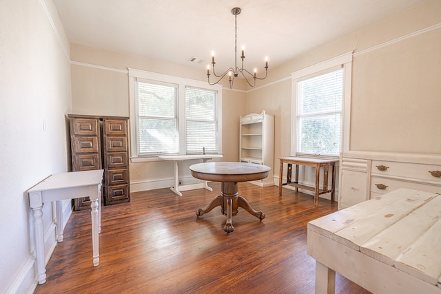 misc room with crown molding, a healthy amount of sunlight, a chandelier, and dark hardwood / wood-style flooring