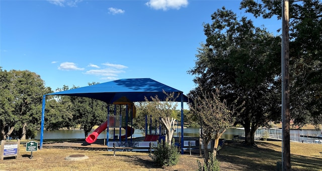 view of playground featuring a water view