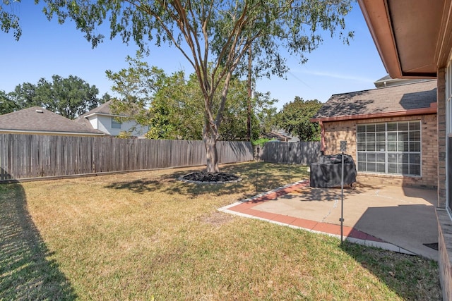 view of yard with a patio area