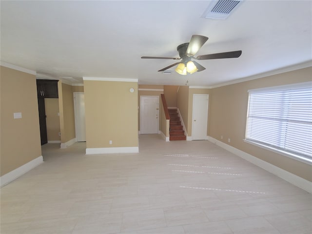 unfurnished room featuring crown molding and ceiling fan