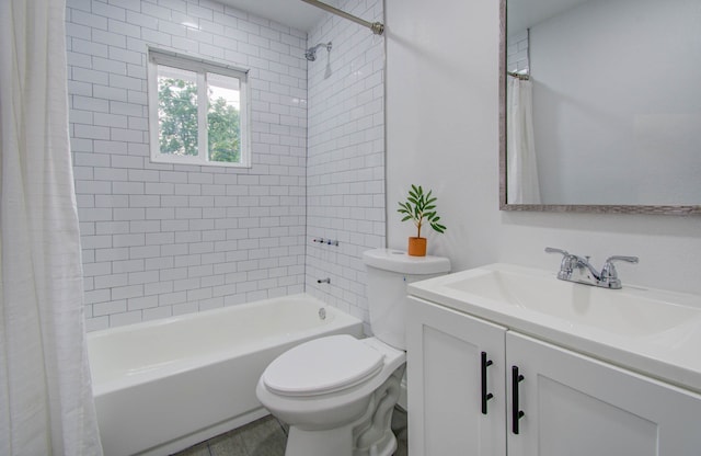 full bathroom featuring toilet, shower / bath combo, and vanity