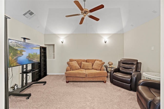 living room with ceiling fan, carpet, and lofted ceiling