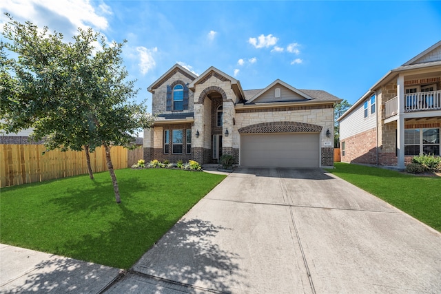 view of front facade featuring a balcony, a front lawn, and a garage