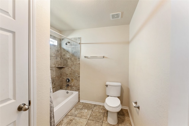 bathroom with toilet, a textured ceiling, shower / bathtub combination with curtain, and tile patterned floors