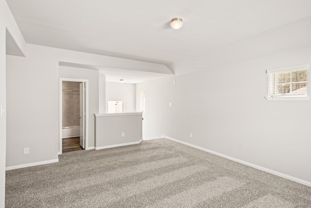 unfurnished room with carpet floors