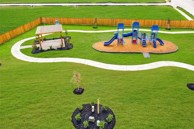 view of playground with a yard