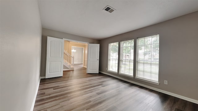 spare room featuring light wood-type flooring