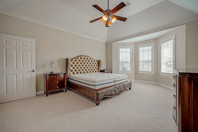 carpeted bedroom with ceiling fan, lofted ceiling, and crown molding