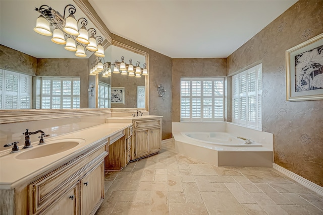 bathroom featuring vanity and a bath