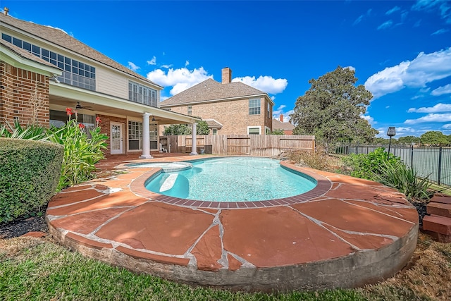 view of swimming pool featuring ceiling fan