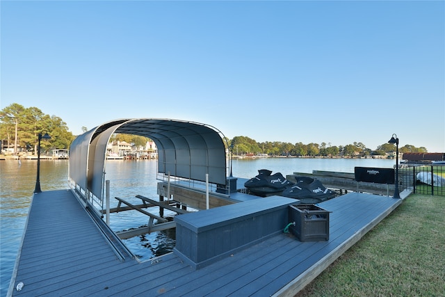 view of dock with a water view