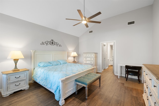 bedroom with dark hardwood / wood-style floors, high vaulted ceiling, and ceiling fan