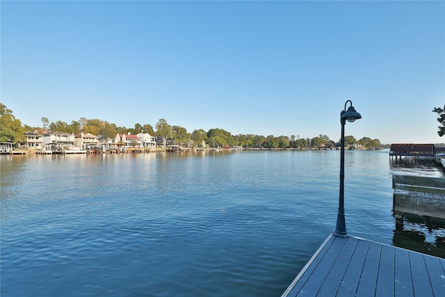 view of dock with a water view