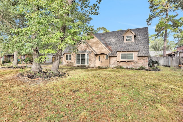 view of front of house with a front lawn