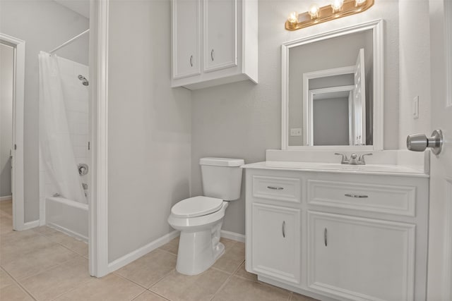 full bathroom with vanity, shower / tub combo with curtain, toilet, and tile patterned floors