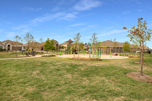 view of play area with a yard