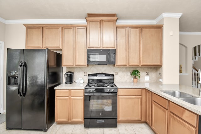 kitchen featuring sink, black appliances, ornamental molding, and tasteful backsplash