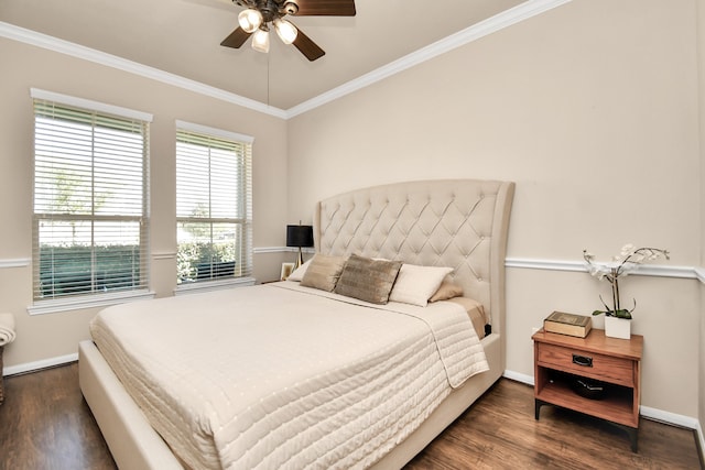 bedroom featuring crown molding, ceiling fan, and dark hardwood / wood-style flooring