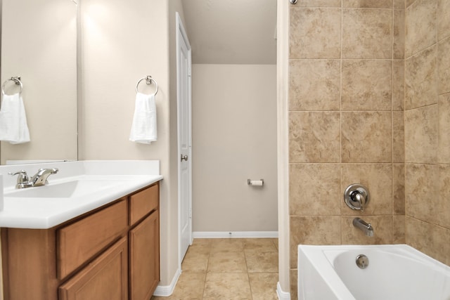 bathroom with vanity, tiled shower / bath combo, and tile patterned flooring