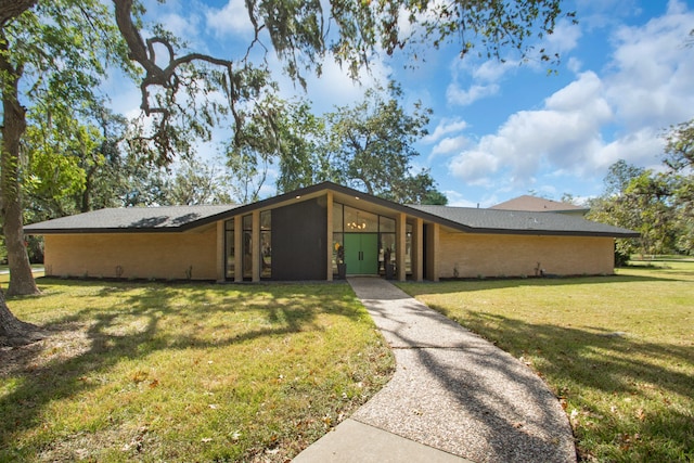 exterior space with a lawn