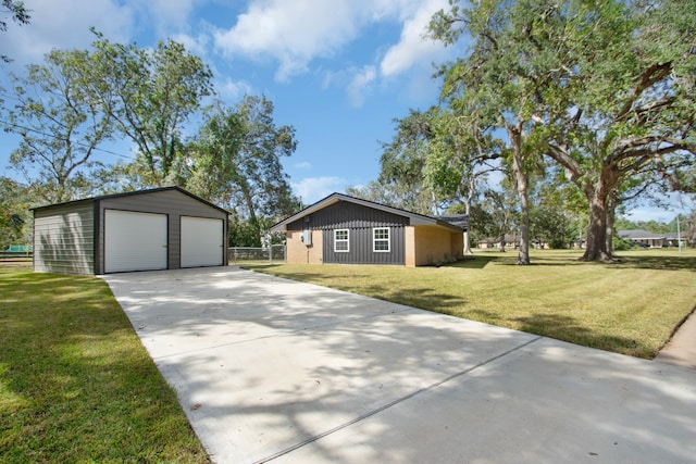 view of home's exterior with a garage, an outdoor structure, and a lawn