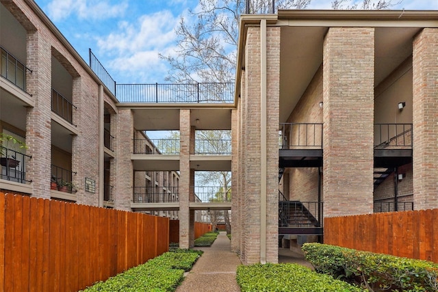 4643 Wild Indigo Unit 414, Houston, TX 77027 - view of property featuring fence