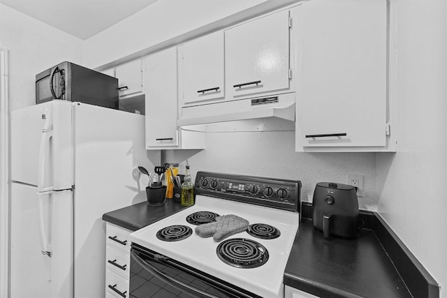 4643 Wild Indigo Unit 414, Houston, TX 77027 - kitchen featuring freestanding refrigerator, under cabinet range hood, range with electric cooktop, and white cabinetry