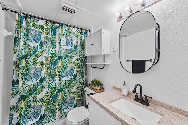 4643 Wild Indigo Unit 414, Houston, TX 77027 - bathroom with toilet, a textured wall, visible vents, and a shower with shower curtain