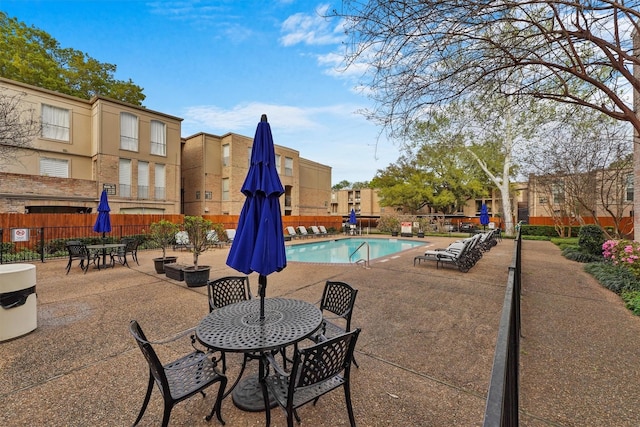 4643 Wild Indigo Unit 414, Houston, TX 77027 - community pool featuring fence and a patio area