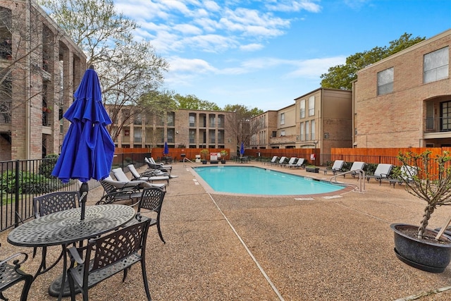 view of pool featuring a patio