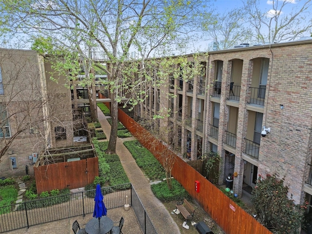 4643 Wild Indigo Unit 414, Houston, TX 77027 - view of home's community featuring fence