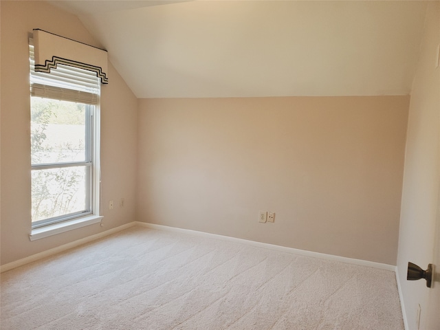 bonus room featuring carpet flooring, plenty of natural light, and lofted ceiling