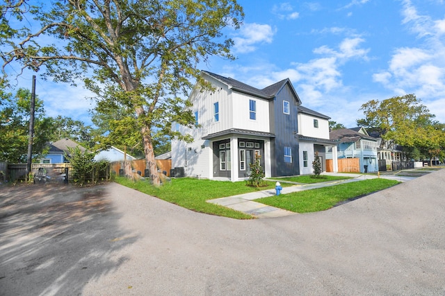 view of front of home with a front yard