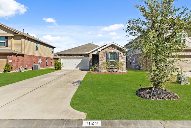 view of front facade featuring a front yard, central AC, and a garage