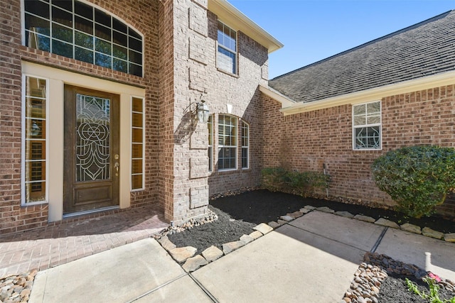 doorway to property with a patio area