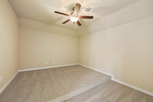 empty room featuring carpet flooring and ceiling fan