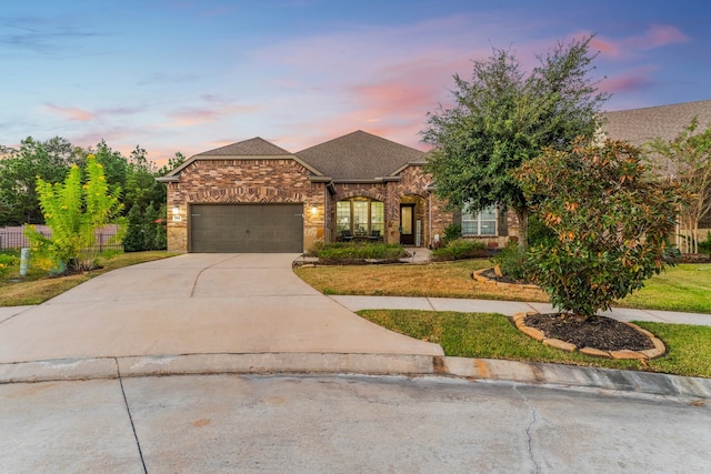 view of front of home with a garage