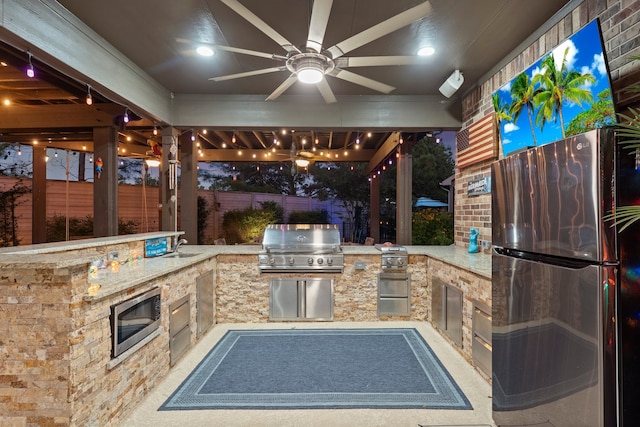 view of patio featuring grilling area, ceiling fan, and area for grilling