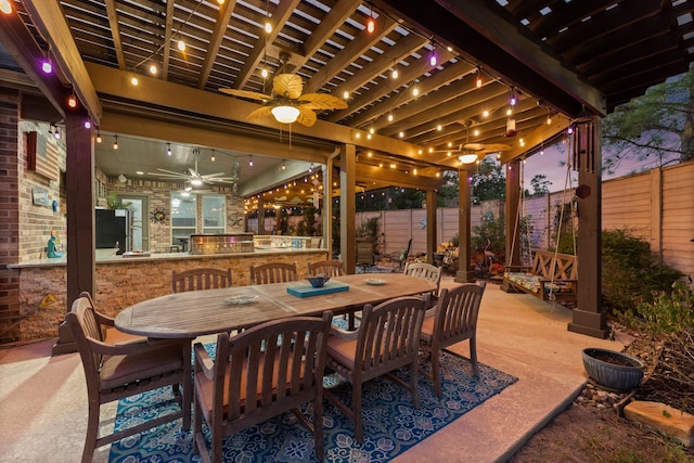 view of patio featuring a pergola and ceiling fan