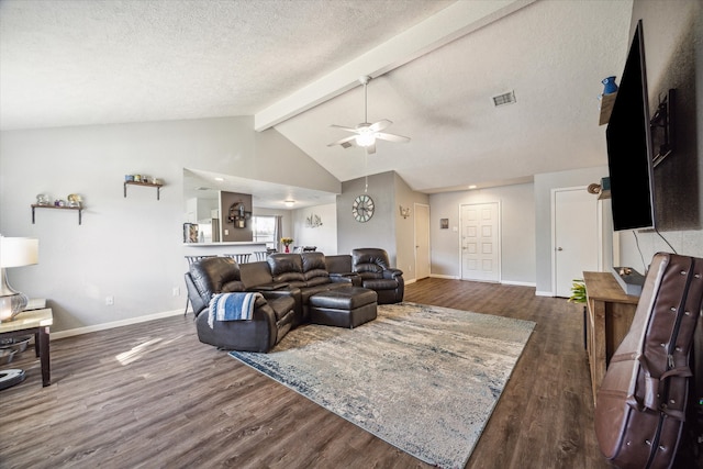 living room featuring ceiling fan, lofted ceiling with beams, a textured ceiling, and dark hardwood / wood-style floors