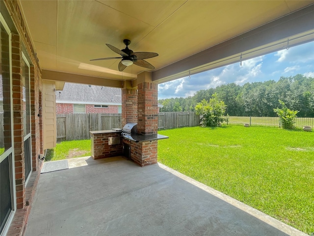 view of patio / terrace with ceiling fan and a grill