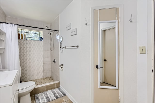 bathroom with vanity, toilet, tile patterned floors, and a shower with shower curtain