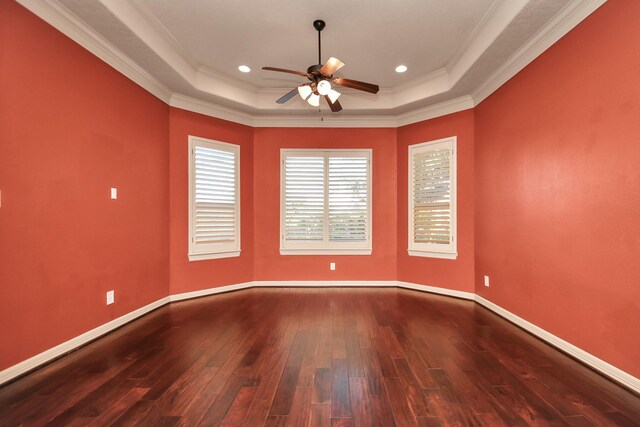 23011 Little Harbor Way, Katy, TX 77494 - spare room featuring crown molding, ceiling fan, a raised ceiling, wood-type flooring, and baseboards