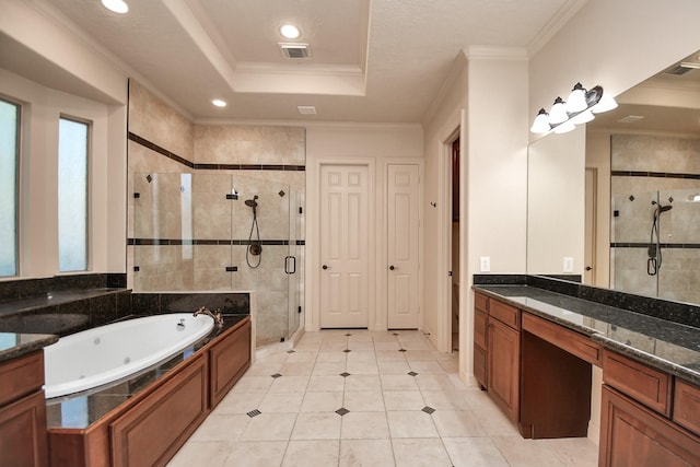 full bath featuring a tray ceiling, ornamental molding, a shower stall, and a tub with jets