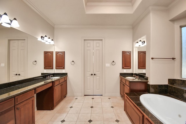 bathroom with tile patterned flooring, a tub with jets, two vanities, a sink, and ornamental molding